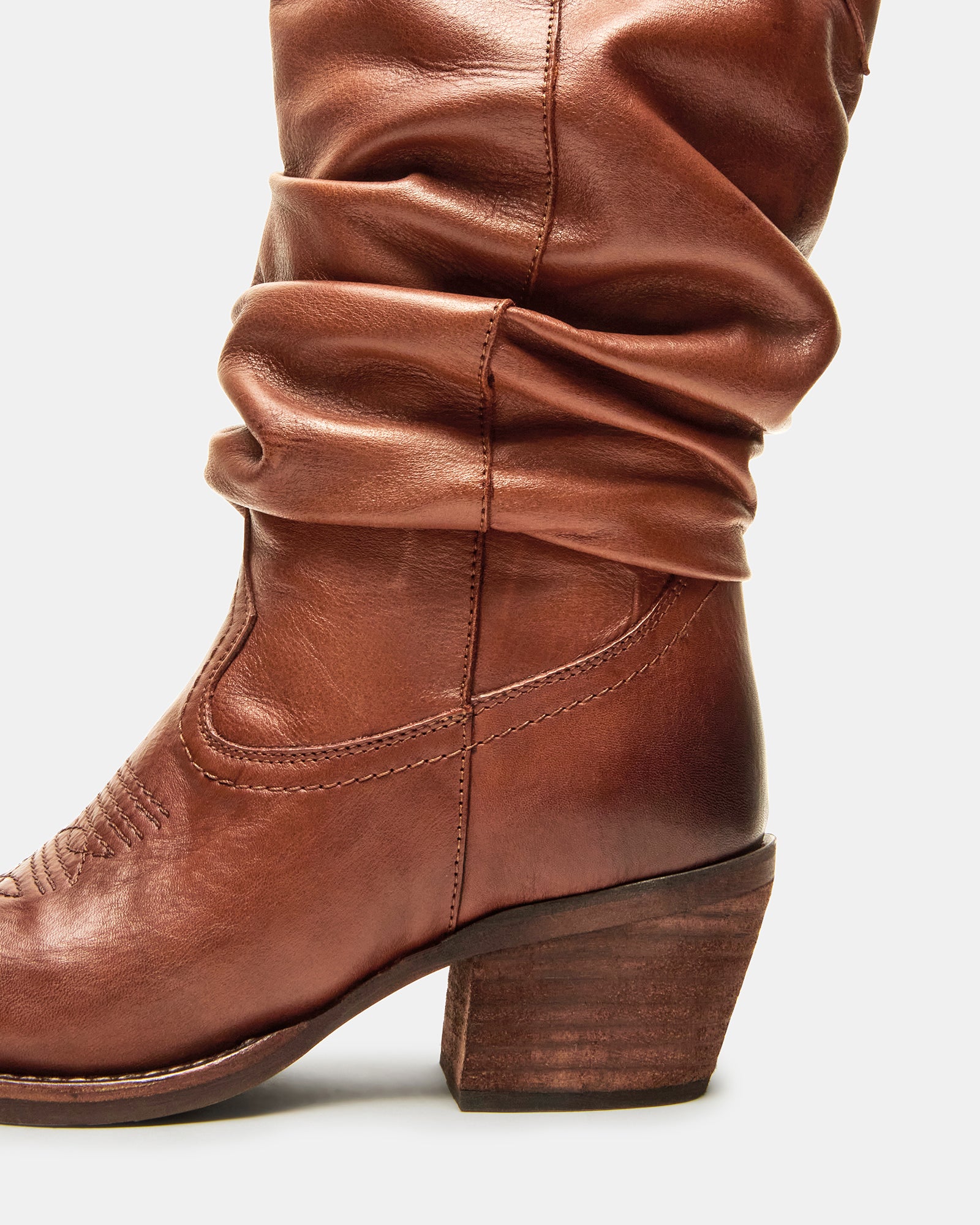 STEVEMADDEN_SHOES_STAGE_COGNAC-LEATHER_05_33d39aa4-5780-4195-b8a9-ee1bc69ba02c.jpg