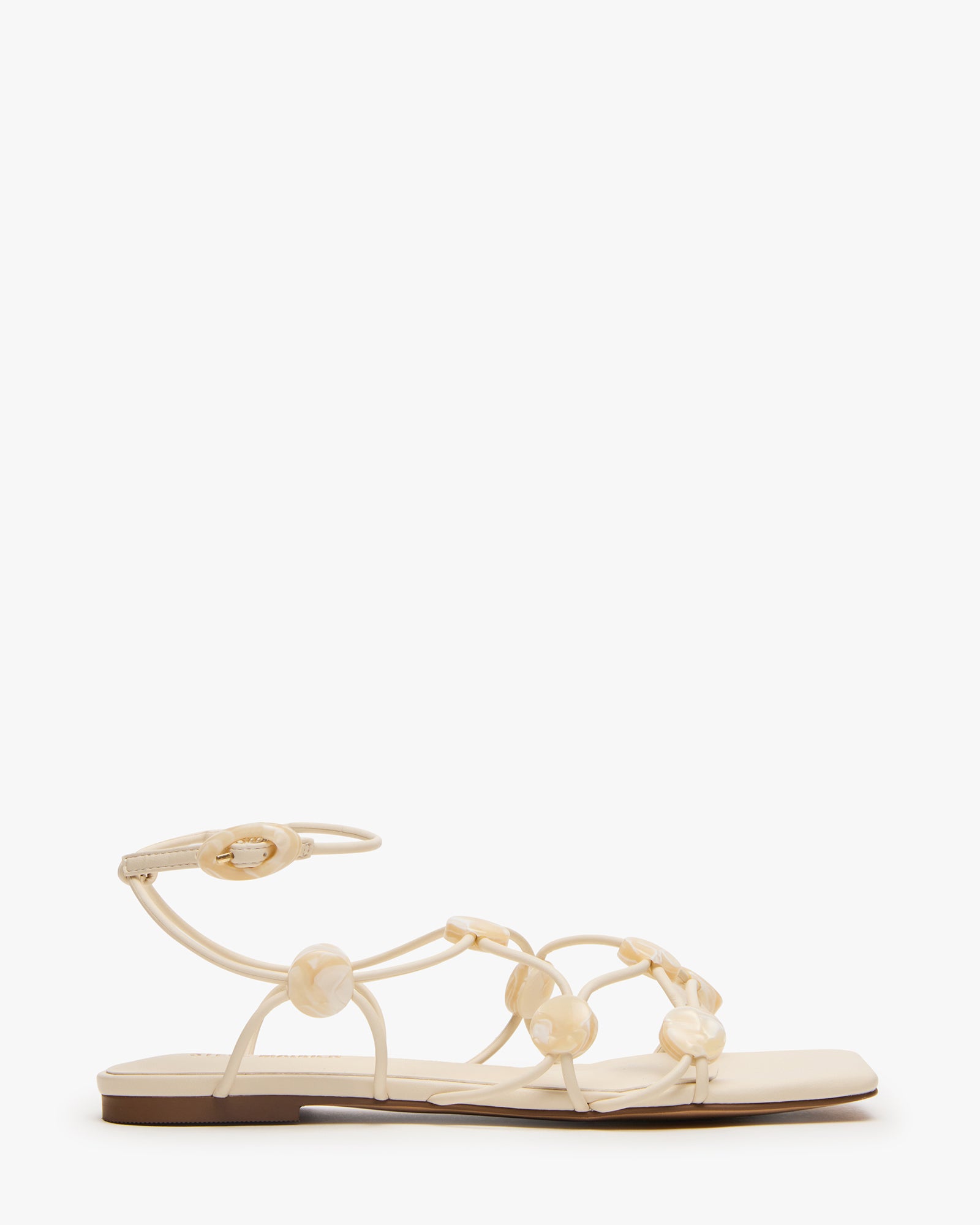 STEVEMADDEN_SHOES_TIDES_OFF-WHITE.jpg